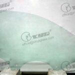 LH FRONT DOOR GLASS GREEN